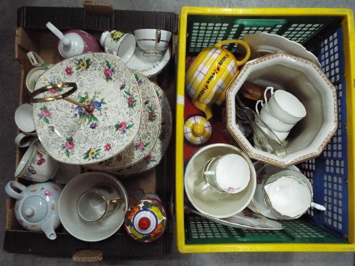 A lot of mixed ceramics with a small quantity of flatware, two boxes.