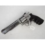A Black Ops 6 inch Barrel Silver 12g CO2 Air Pistol Revolver Fires 4.5 mm BBs 6 shot.