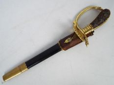A German Hunting Dagger, brass, antler mounted hilt,