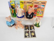 A set of five Wade Natwest piggy banks, all with stoppers, largest approximately 18.