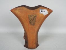 Anne James - A studio pottery axe head form vase, incised makers mark to the base, approximately 20.
