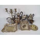 A collection of plated ware to include teapots, candelabra, cream jug and similar.