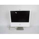An Apple iMac desktop computer, no accessories.