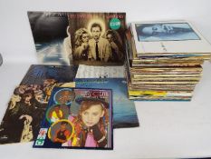 12" vinyl record collection to include Pete Townshend, Earth Wind & Fire, Whitney Houston,