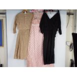 Three vintage dresses comprising a Jean Varon pink A line dress with lace and chequered pattern,