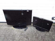 A 32" LCD television and a 22" LCD television / DVD player.