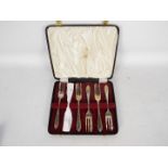 A cased set of six silver pastry forks, Sheffield assay, approximately 165 grams / 5.3 ozt.
