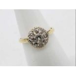 An 18ct yellow gold diamond cluster ring, size K,