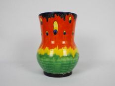 A Crown Ducal Firefly pattern vase, approximately 18 cm (h).