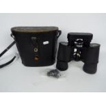 A pair of Boots Admiral binoculars, 10 x 50 mm, contained in case.