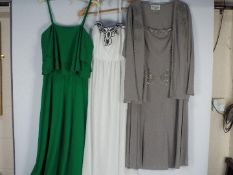 Three vintage dresses comprising a Frank Usher two piece dress with matching jacket, size 38,