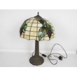 A large Tiffany style table lamp,