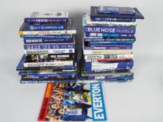 Two boxes of publications relating to Everton Football Club to include biographies,