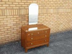 A vanity chest of three graduated drawers, approximately 150 cm x 92 cm x 49 cm.