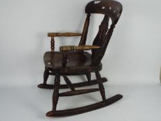 A child's rocking chair.