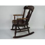 A child's rocking chair.