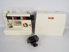 A Brother sewing machine in carry case, model 531.