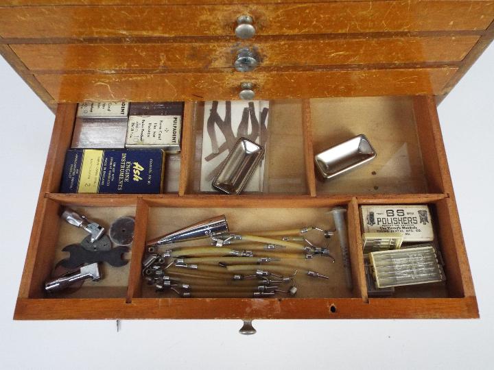 A dentists counter top or portable cabinet containing a quantity of dental tools and similar. - Image 5 of 9
