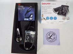 A boxed Beurer Medical blood pressure monitor and a Littmann Brand electronic stethoscope,
