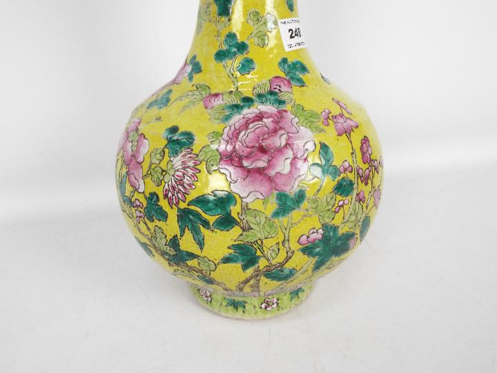 A vase decorated with chrysanthemum against a yellow ground, - Image 4 of 13