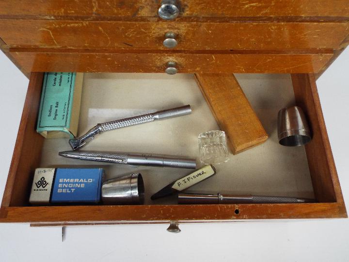 A dentists counter top or portable cabinet containing a quantity of dental tools and similar. - Image 4 of 9