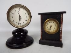 A vintage Smiths car dashboard clock, now mounted to base to form a desk clock,