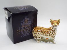 Royal Crown Derby - A boxed paperweight, Leopard Cub, with gold stopper, approximately 8 cm (h).