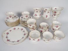 A quantity of Royal Windsor tea wares in the Cottage Roses pattern, approximately 40 pieces.