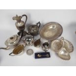 A collection of plated ware to include teapots, claret jug, cream jugs, sugar bowls and similar.