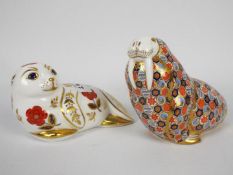 Royal Crown Derby - A walrus form paperweight with gold stopper,