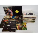 12" vinyl record collection to include Rod Stewart, Madonna, Michael Jackson, The Eagles, Boston,