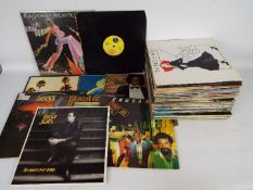 12" vinyl record collection to include Rod Stewart, Madonna, Michael Jackson, The Eagles, Boston,