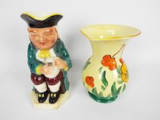 Lot to include a Burlington Ware Toby jug and a Beswick jug with floral decoration,