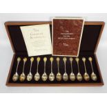 A cased Royal Society for the Protection of Birds spoon collection comprising twelve silver spoons