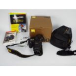 Photography - A Nikon D90 camera with carry case and original box.
