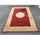 A Chinese wool carpet measuring approximately 180 cm x 275 cm.