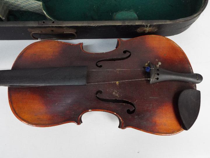 A vintage violin, no label to the interior, approximately 59 cm (l), - Image 2 of 9