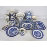 A collection of blue and white ceramics to include plates, jugs, vases and similar.