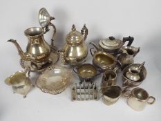 A collection of mixed plated ware to include teapots, coffee pot, sugar bowls, cream jugs,