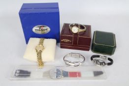A collection of wrist watches to include Swatch, Rotary, Gucci and similar, part boxed.