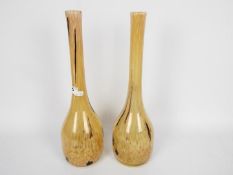 A pair of art glass vases of slender necked form, approximately 42 cm (h).