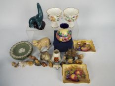 Lot to include Wedgwood, Royal Doulton, Poole Pottery, Wade and similar.