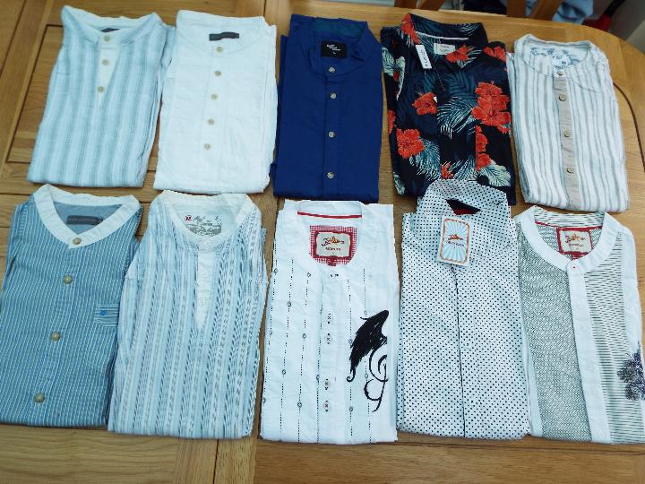 A job lot of 10 Casual Shirts, predominantly size M with a few L,