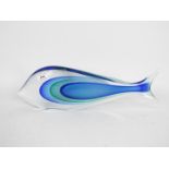 A large Murano style ornament in the form of a stylised fish, signed to the base,