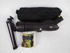 An Optus Zoom 20-60 x 60 spotting scope with table tripod and carry case.