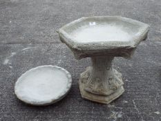 Garden Stoneware - A gothic style bird bath with hexagonal top and additional circular top.