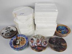 A quantity of various collector plates to include The Three Stooges, Laurel & Hardy,