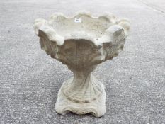 Garden Stoneware - A reconstituted stone urn of tulip form on hexagonal base