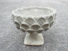 Garden Stoneware - A reconstituted stone pineapple pattern planter on circular base.