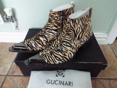 Gucinari - a pair of steel capped fashion boots with tiger decoration,